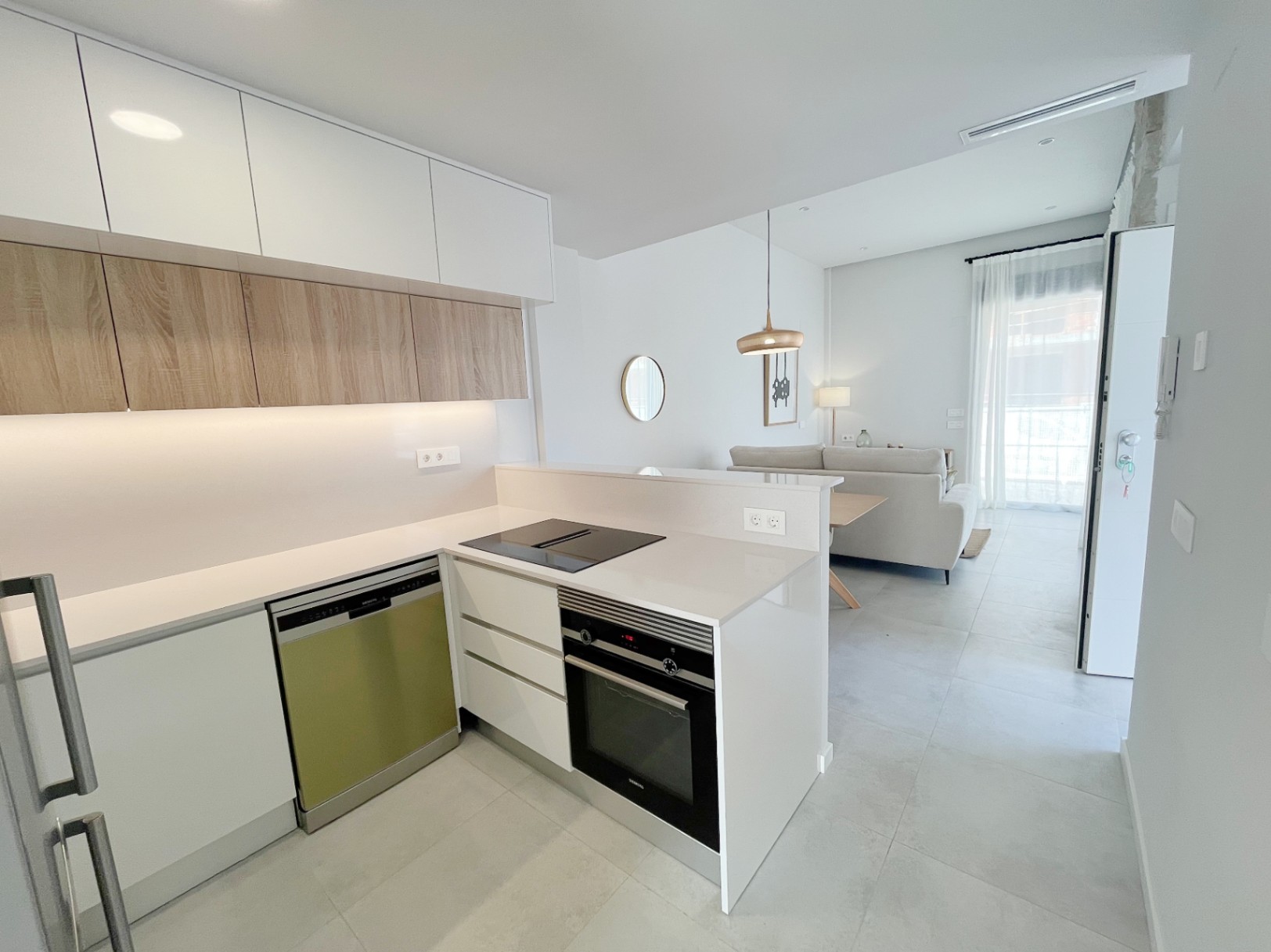 Semi-detached townhouses with private plot in Els Poblets